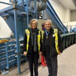 Image shows Lucy Danger, CEO of EMERGE with Eamonn O'Neal, High Sheriff of Greater Manchester in the EMERGE Recycling Plant