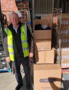 Image show John Whitehead from RODO at EMERGE Recycling delivering the donated PPE